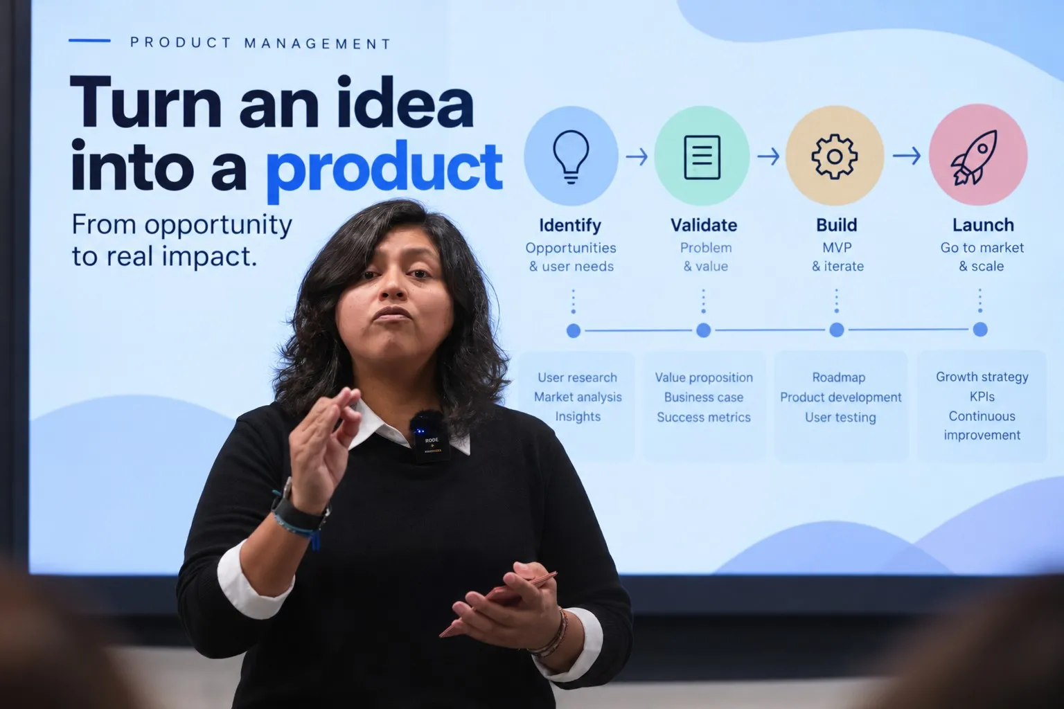 Paola Luyo presenting a product management talk